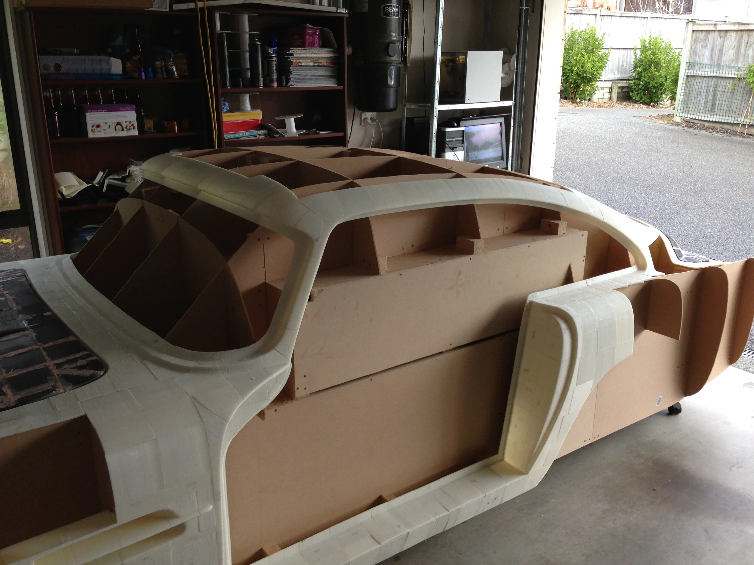 Finishing the DB4's body will require numerous applications of autobody filler, sanding, and repeating until a glassy finish is achieved (Photo: Ivan Sentch)
