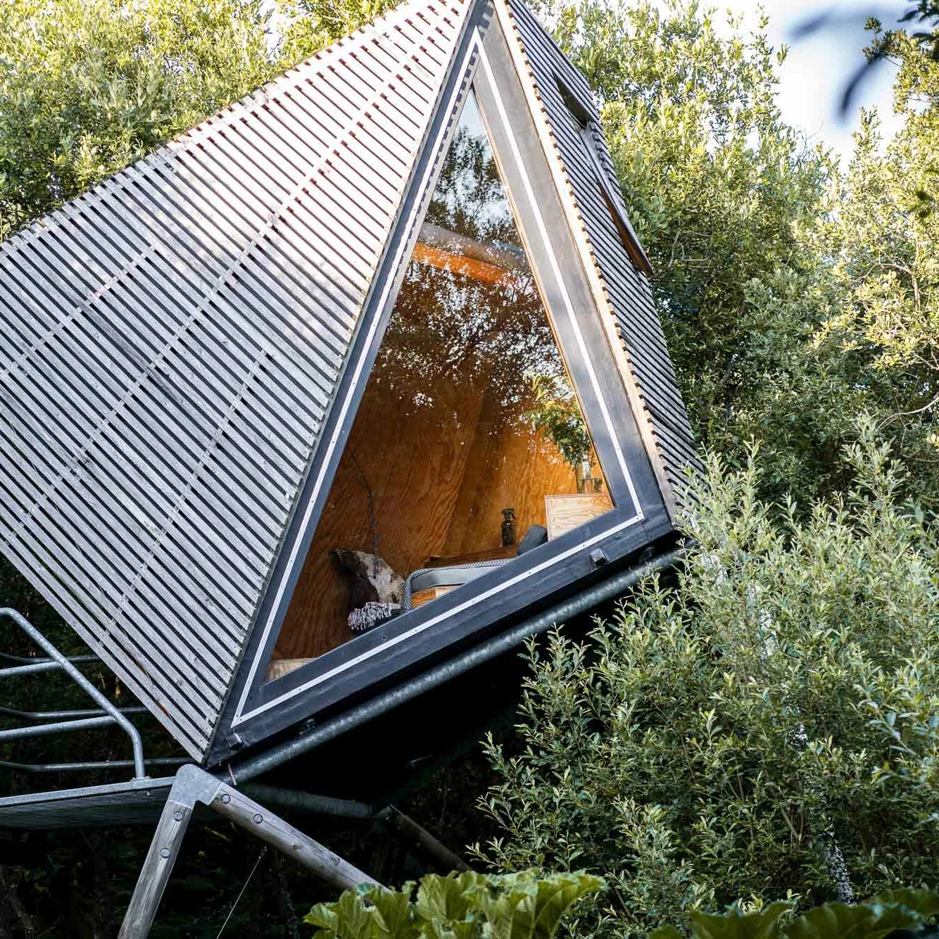 The new K-Tent doesn't have the crystal-clear glass of the cabin, but it does feature a triangular windows inspired by the original