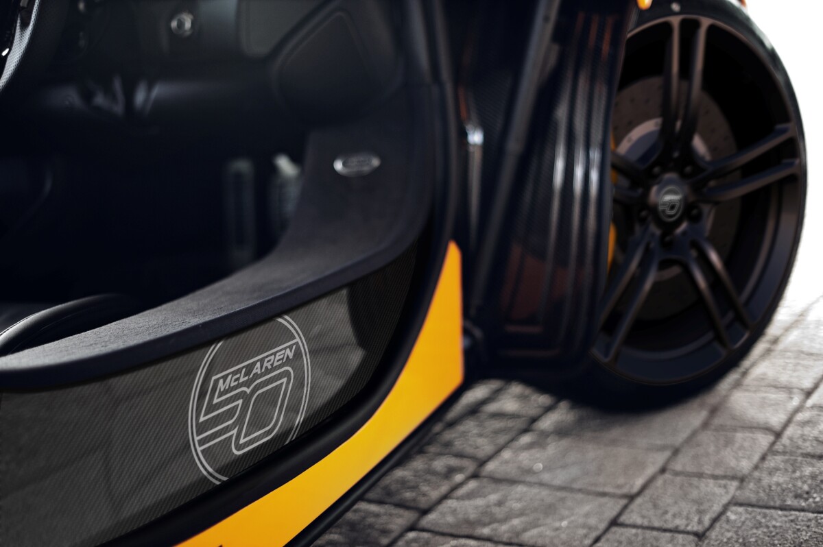 Carbon ceramic brake upgrade and satin black ultra-lightweight wheels enhance the visuals while reducing unsprung weight by 4.4 pounds