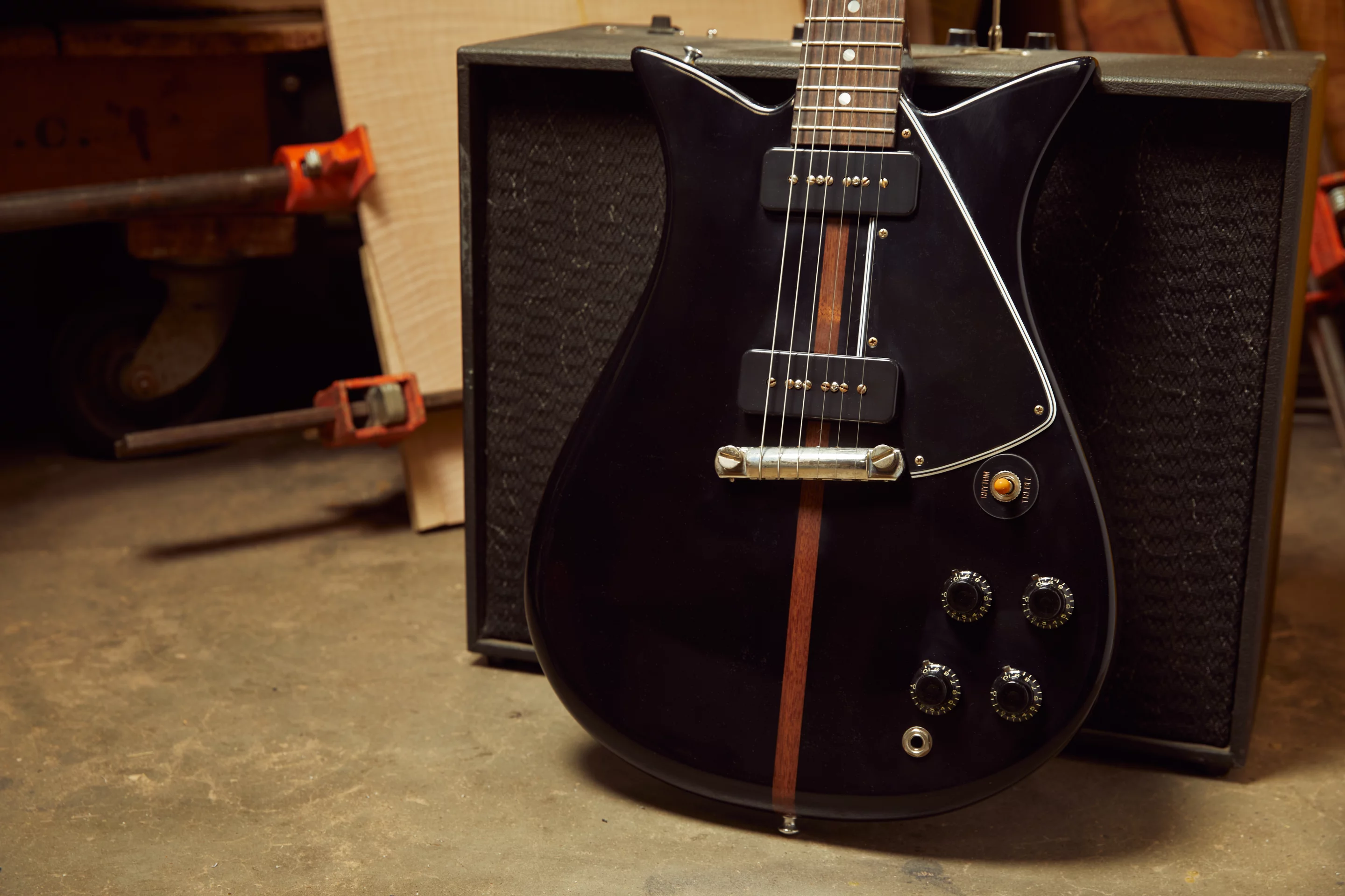 The Theodore guitar's alder body has a strip of walnut running down the middle and is available in natural, cherry or ebony (shown) finishes