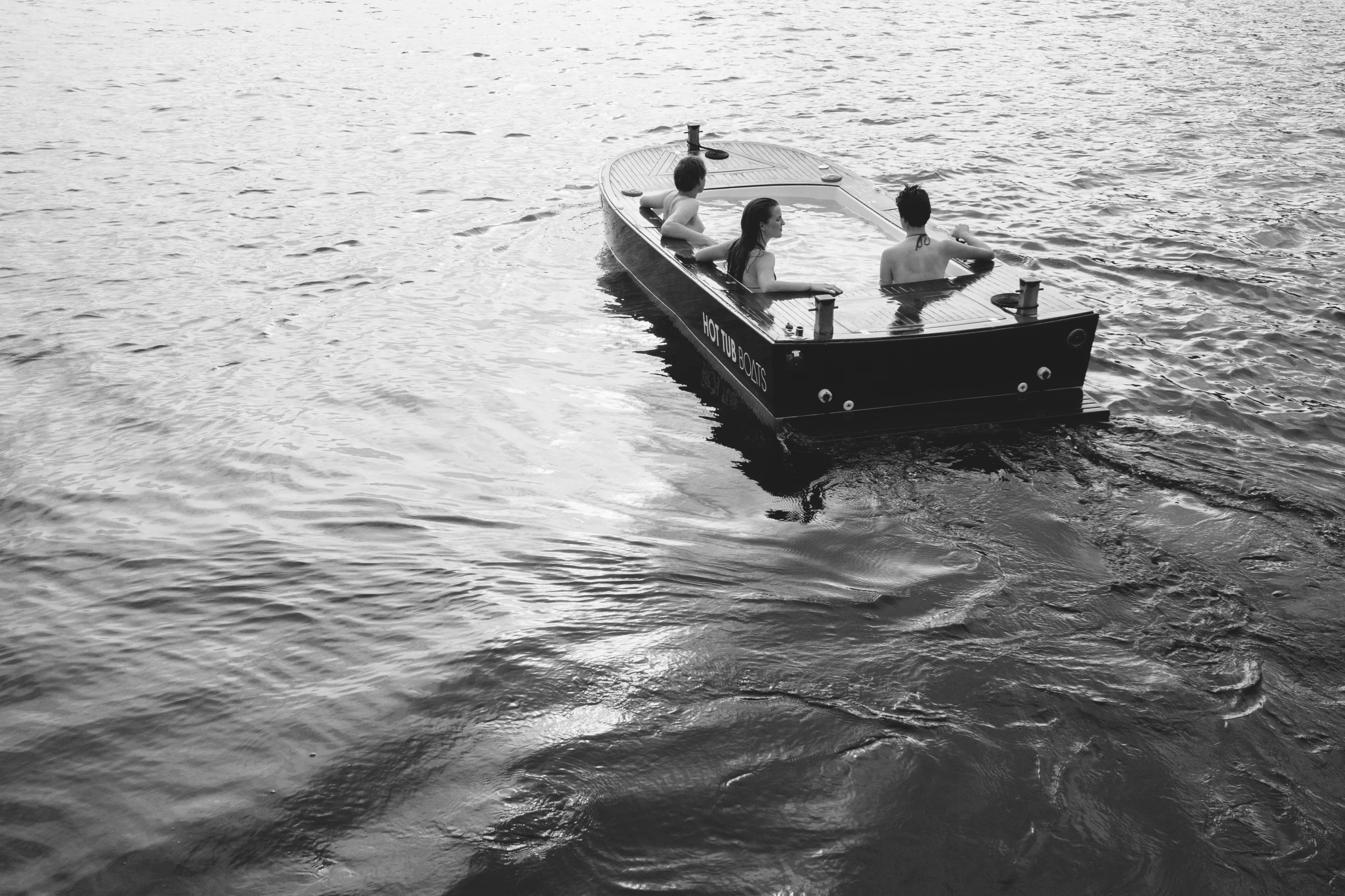 The Hot Tub Boat allows its passengers to soak while they cruise
