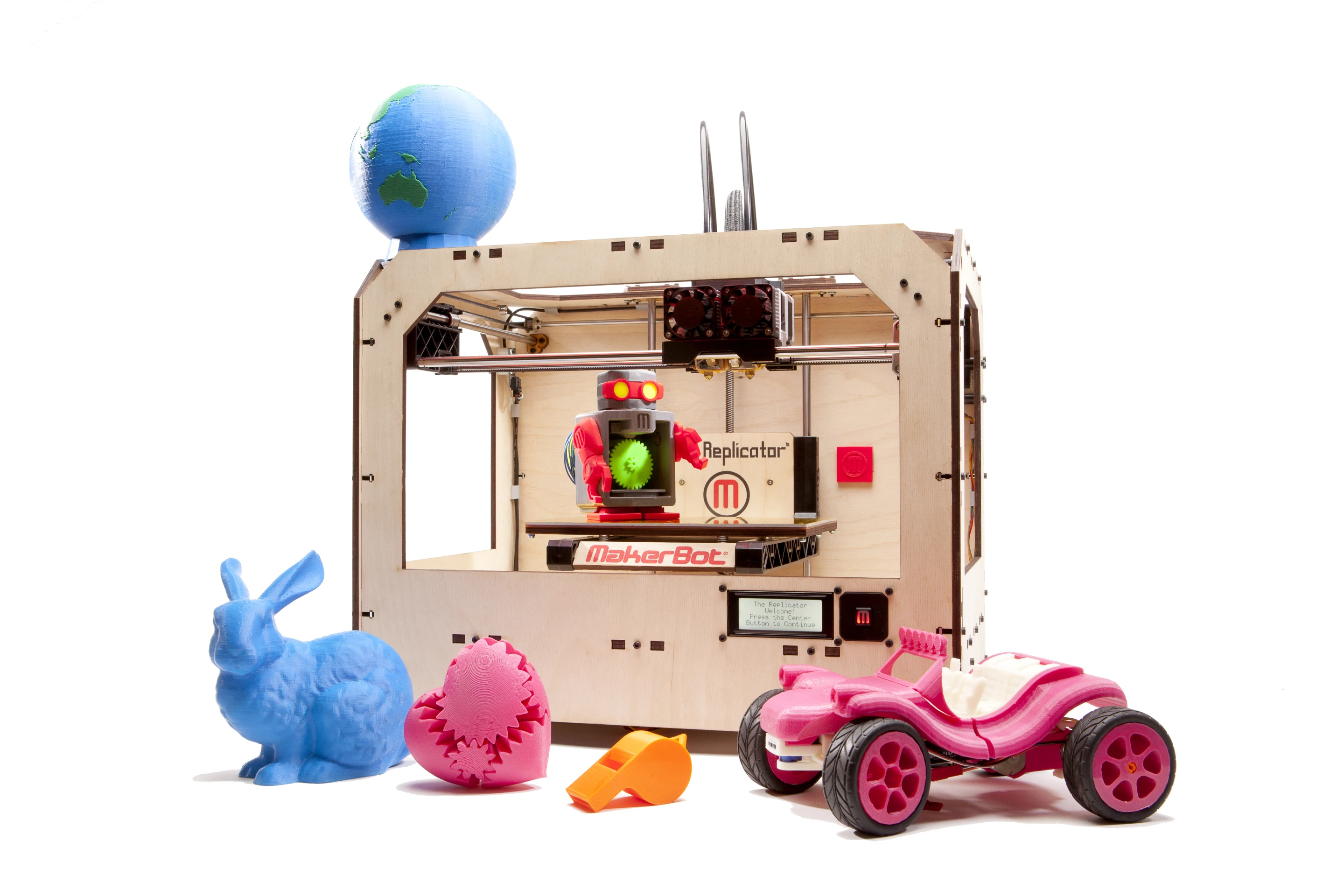MakerBot's new Replicator 3D printer with some of the objects it has produced