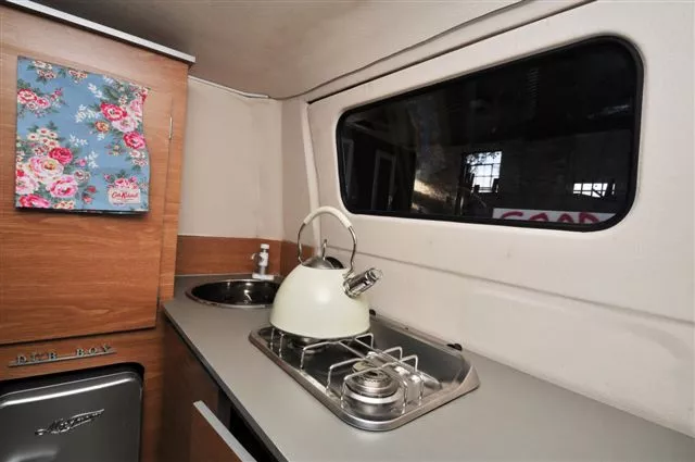 A two-ring stove offers cooking space