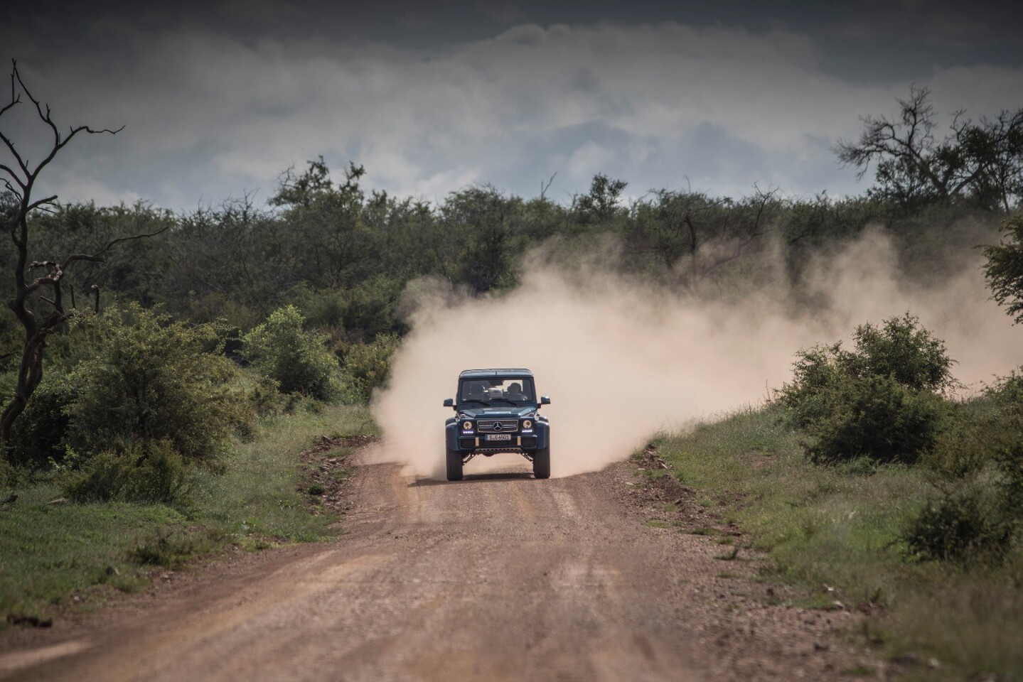 The luxury 7300 pound Maybach G650 Landaulet is more than five meters long and two meters high, with half a meter of ground clearance, and four wheels sharing responsibility for distributing 1000 Nm of torque.