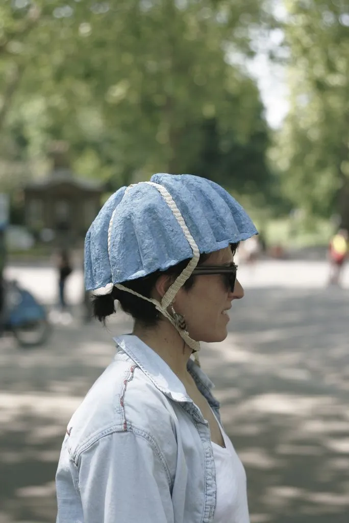 The Paper Pulp Helmet includes large grooves which accommodate the straps and allow the wearer to stay cool