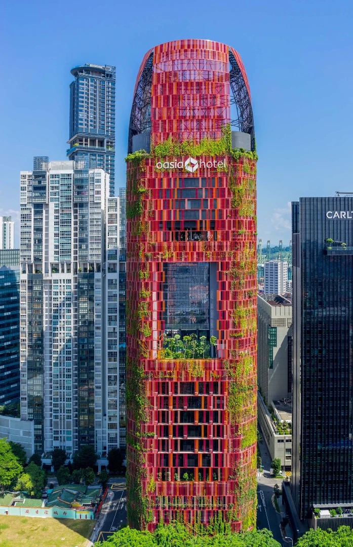 Oasia Hotel Downtown, by WOHA Architects, features a facade covered in plants