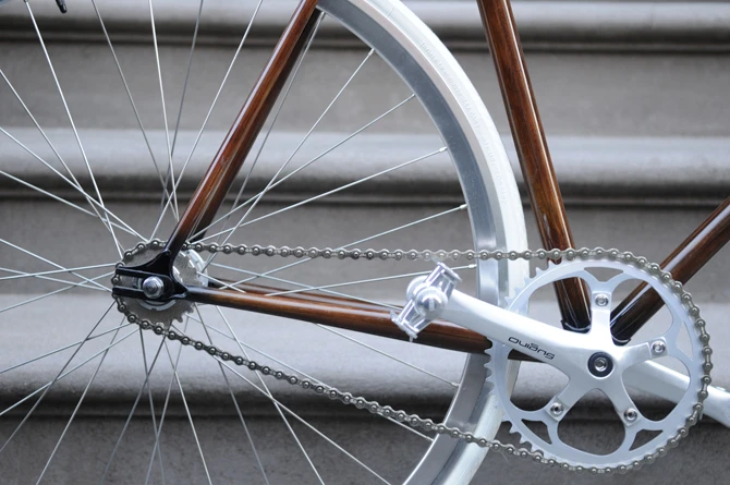 New Zealand's Rob Pollock hand-paints clients' bicycle frames with a faux woodgrain finish