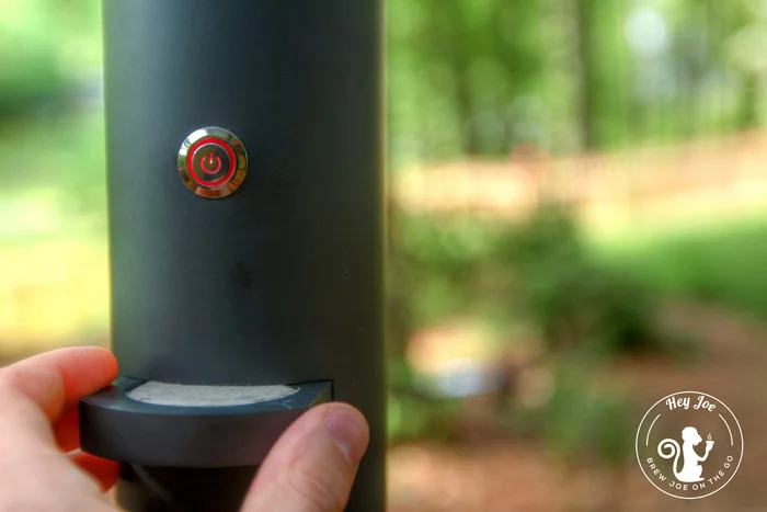 Once the water reaches the preset temperature, it drips through a hole and onto the coffee pod which is seated in a sliding tray in the center of the mug