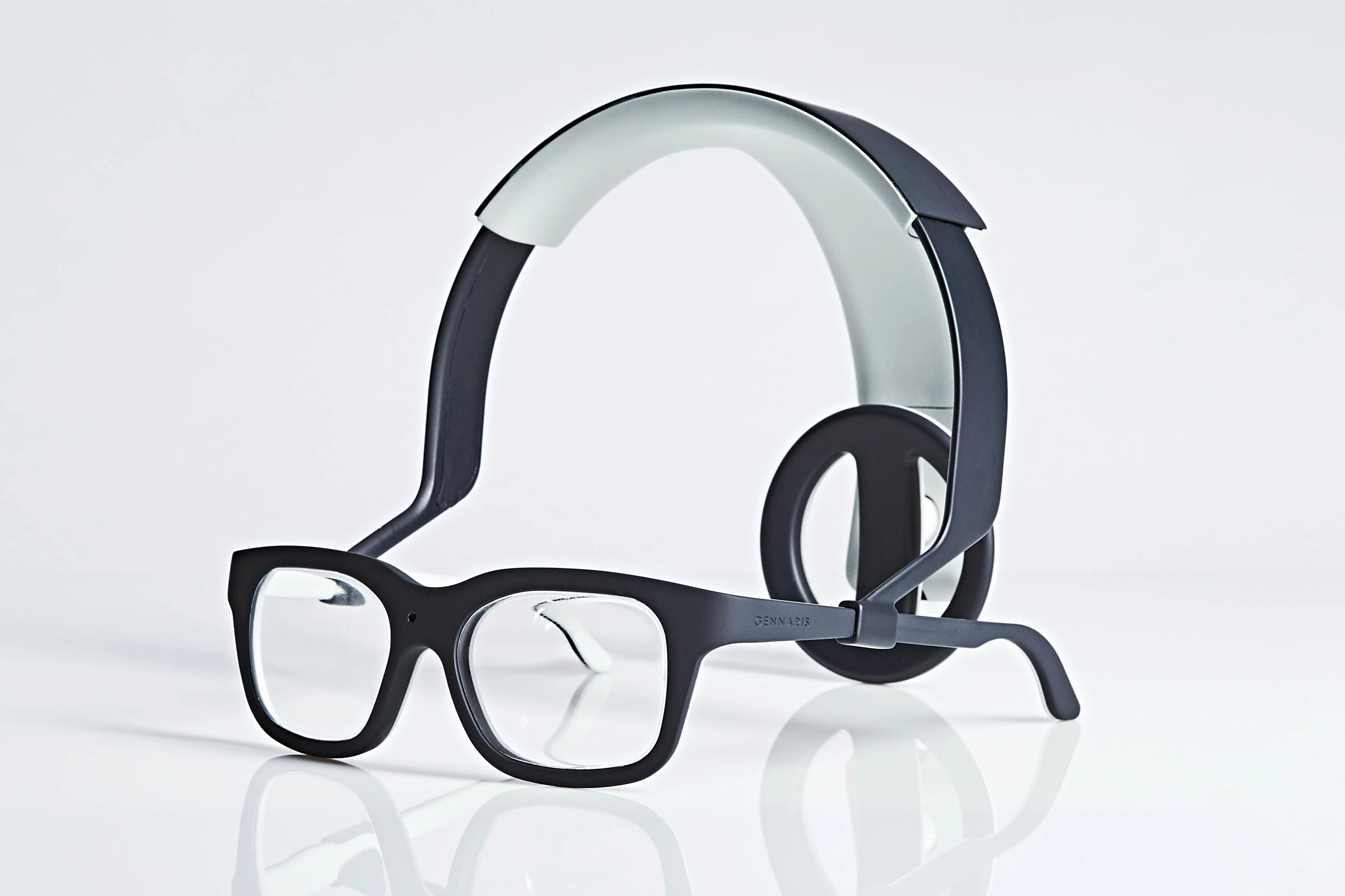 The Gennaris bionic vision system consists of custom headgear with a built-in camera, a wireless transmitter, a vision processor and software, along with a set of square tiles fitted with hair-thin electrodes that are implanted in the brain