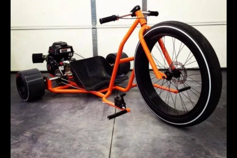 Big Wheel designers pull the foot pegs off the fork and mount them to the frame