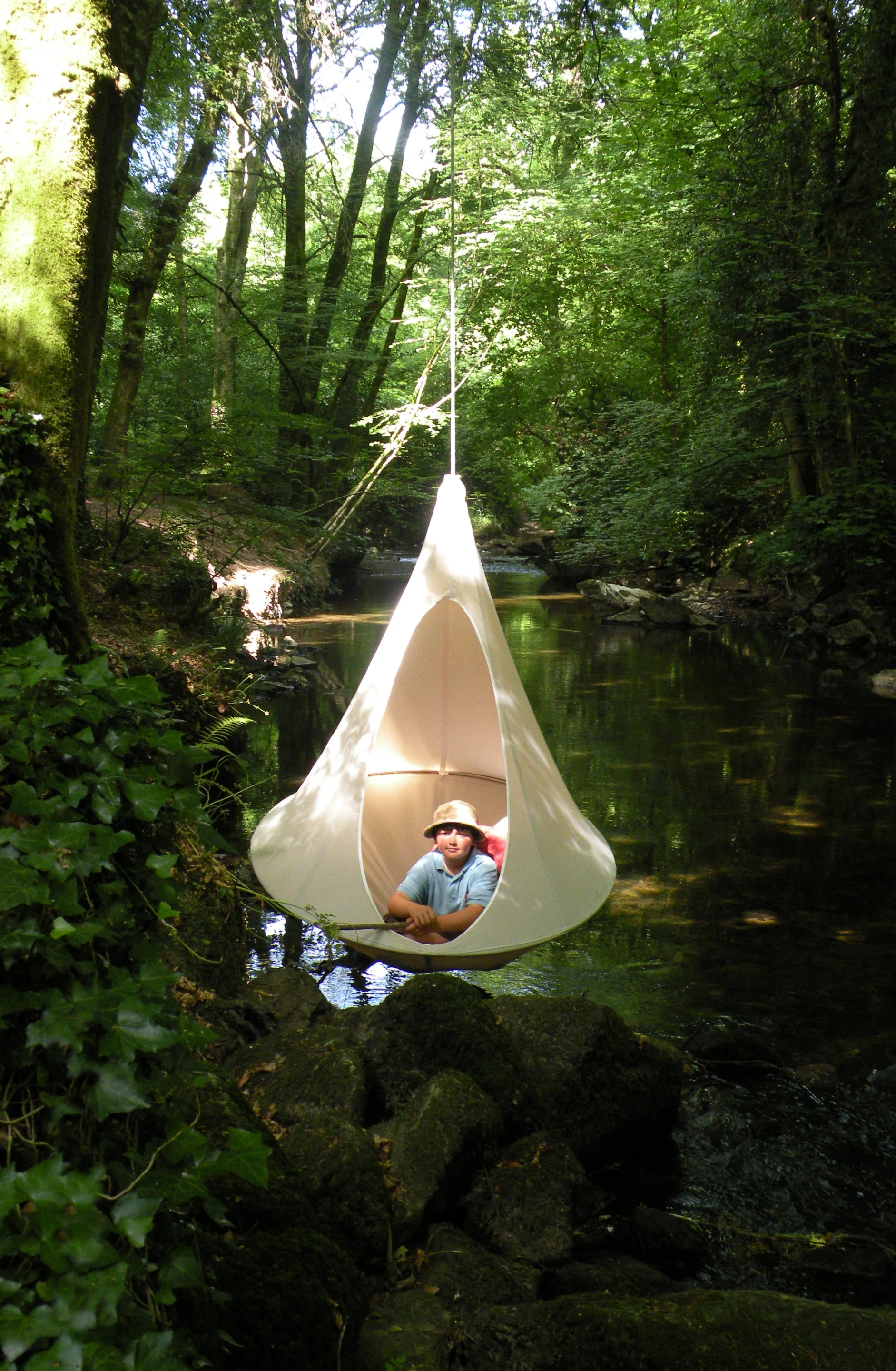 Cacoon is a hanging fabric treehouse designed for adults and children alike