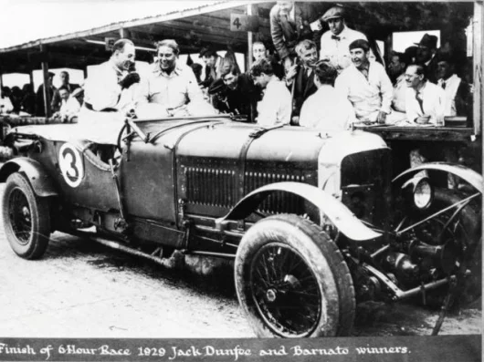 After winning a six hour race in 1929 - Jack Dunfee at left and Woolf Barnato at right