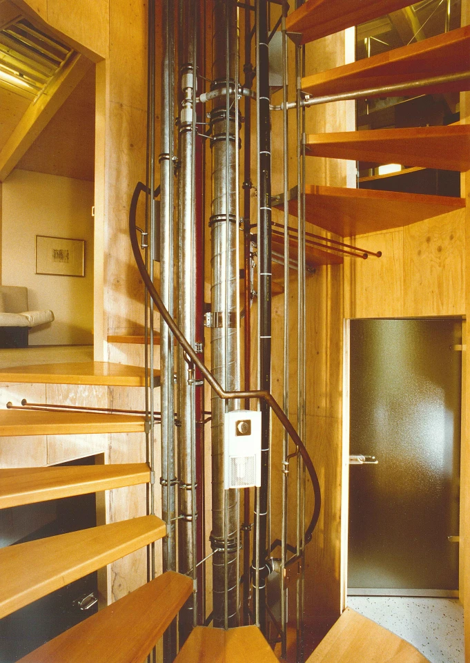 A spiral staircase runs up the central column and provides access to the Heliotrope's upper living space
