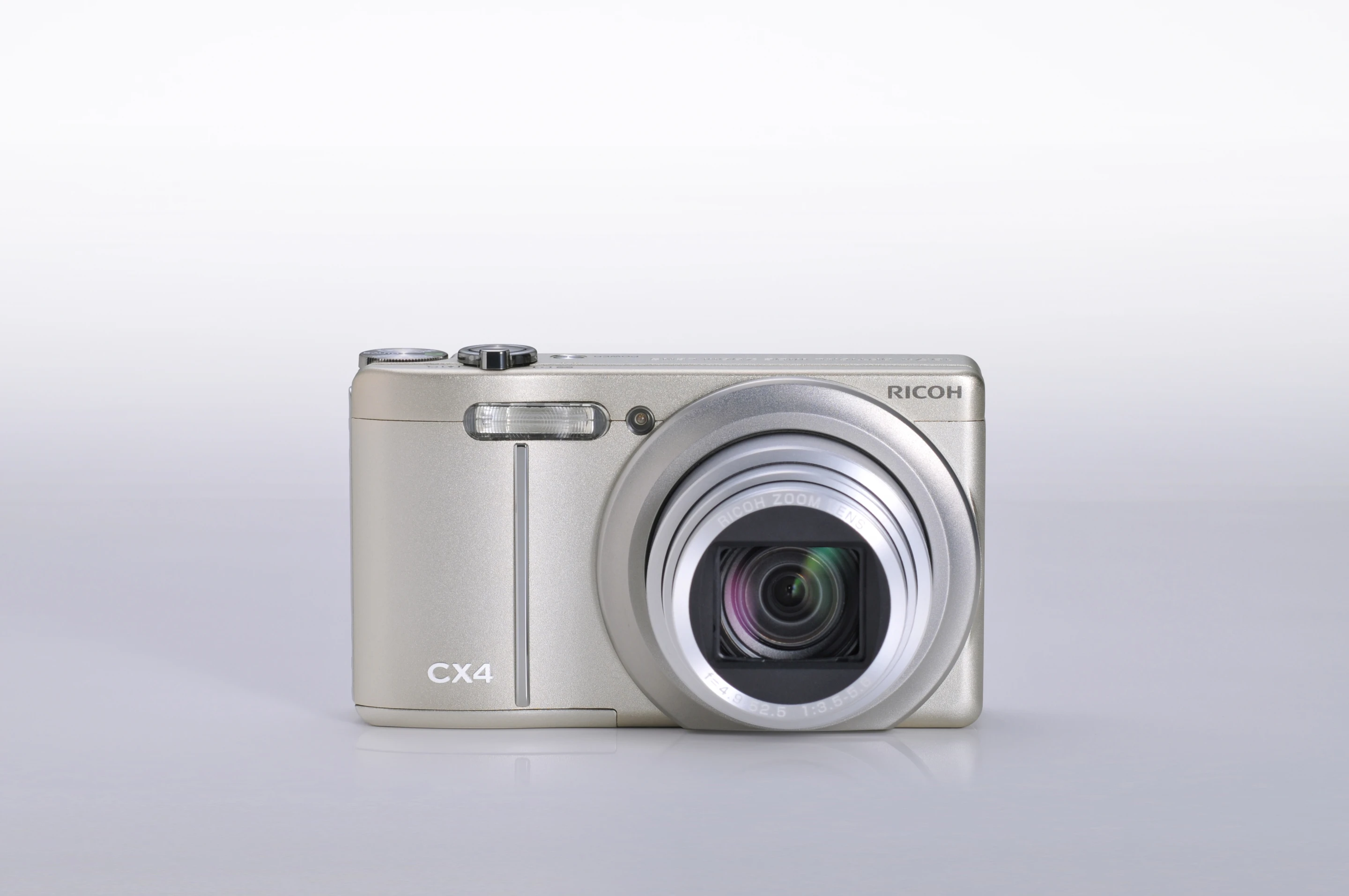 The Champagne silver CX4 from the front, lens open
