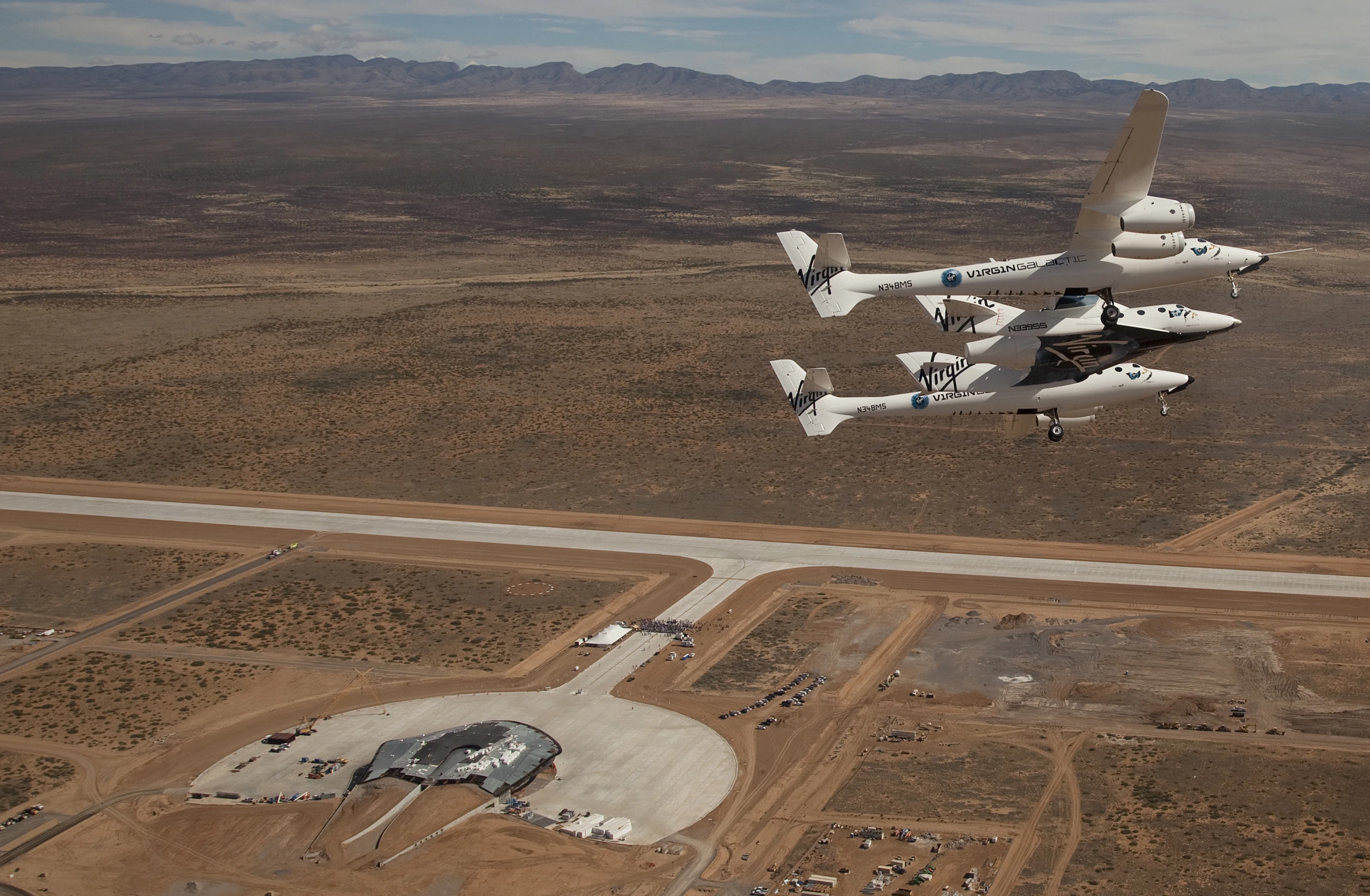 VSS Enterprise flies over the runway dedication ceremony at Spaceport America, New Mexico (Photo: Mark Greenberg)