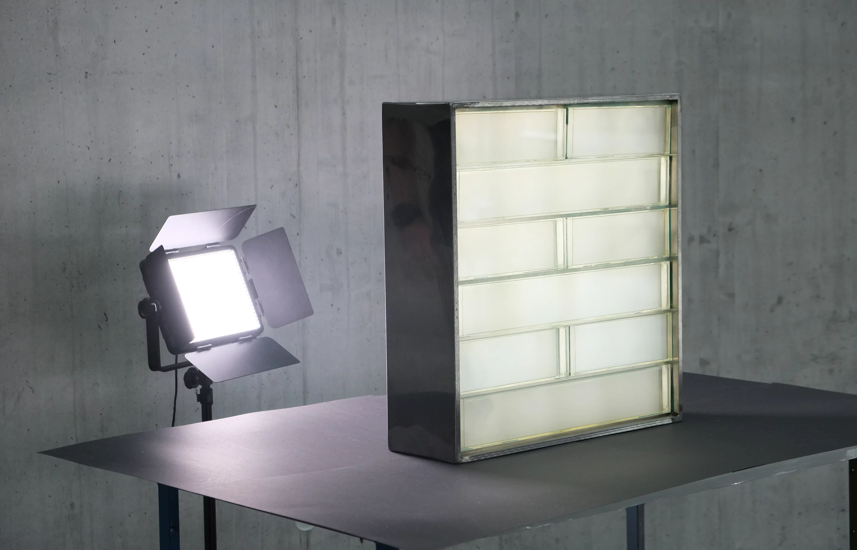 By allowing light to shine through from outside, the bricks could reduce the use (and thus cost) of indoor artificial lighting