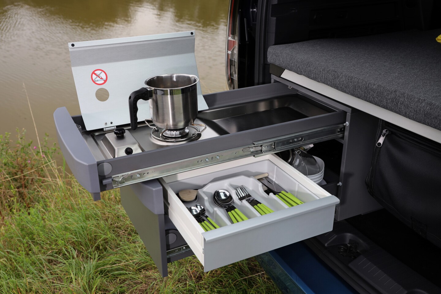 The mini kitchen includes a utensil drawer