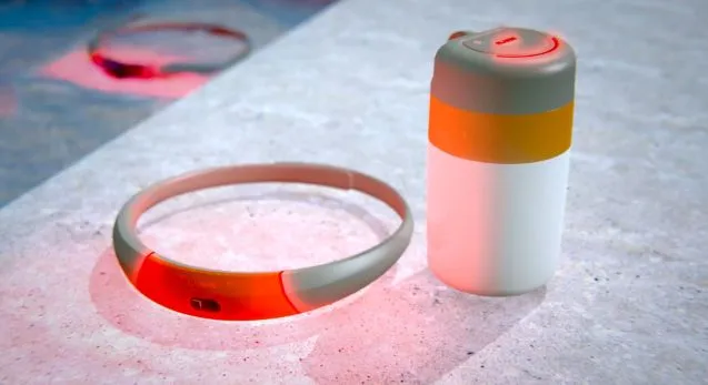 If a SwimBand remains submerged too long, then sound, light and vibrating alarms go off on the other bands and the hub