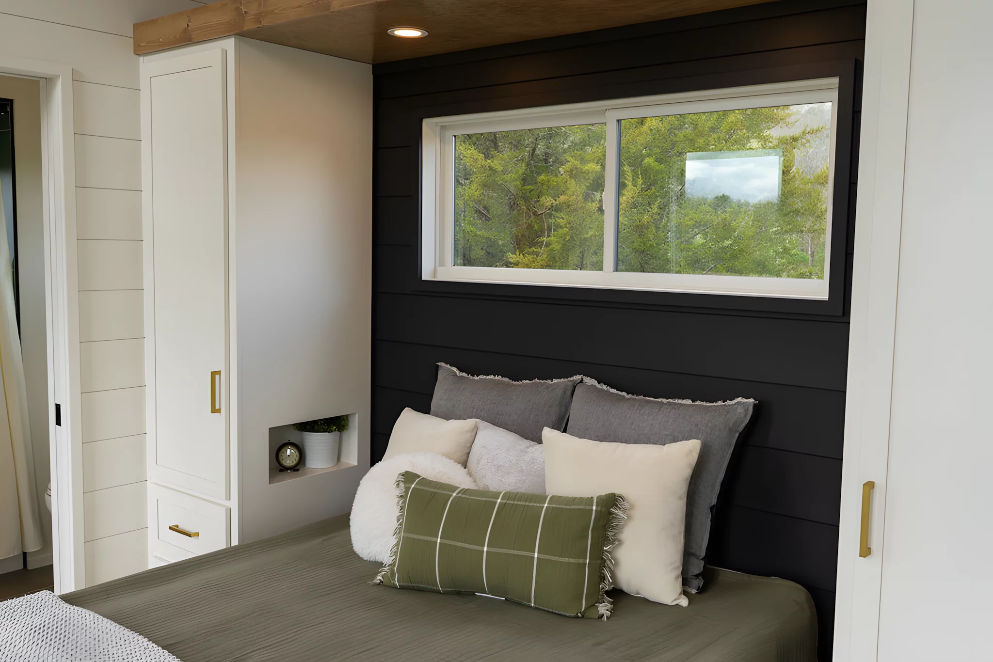 The Rutledge's downstairs bedroom has ample headroom to stand upright and includes some storage space