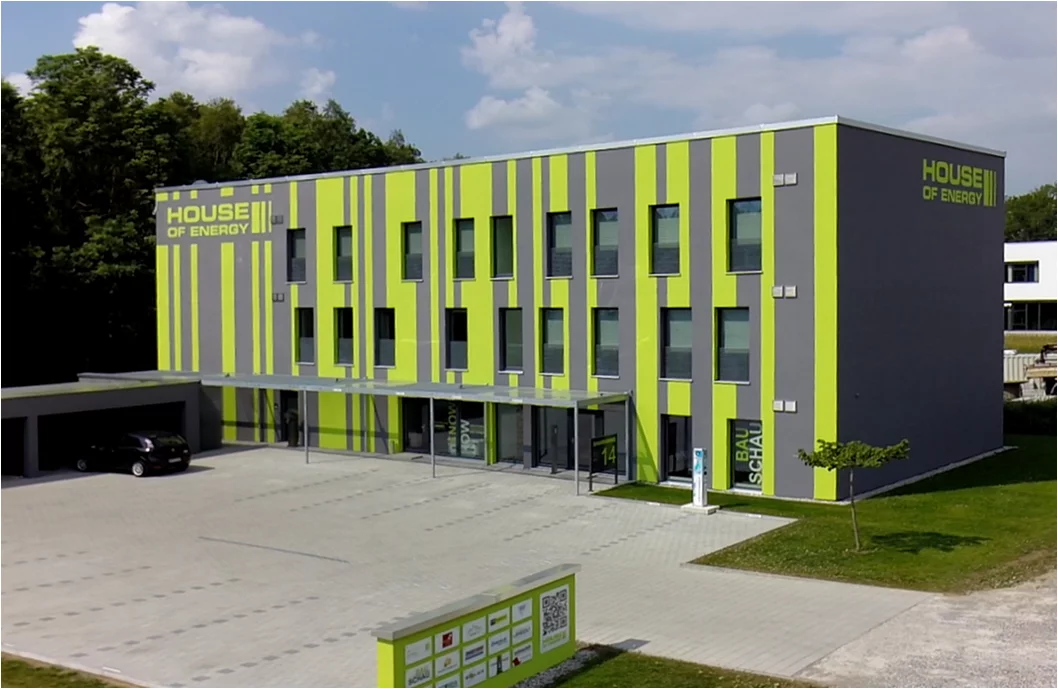 The House of Energy generates 103 kWh / sq m (9.6 kWh / sq ft) of energy a year and uses just 21 kWh / sq m (2 kWh / sq ft) of renewable primary energy annually