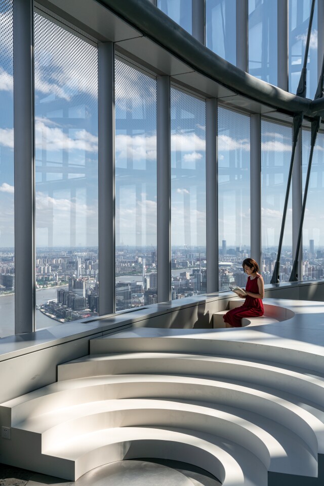 Books over the clouds includes a semi-circular pit which encourages people to gaze at bustling Shanghai below