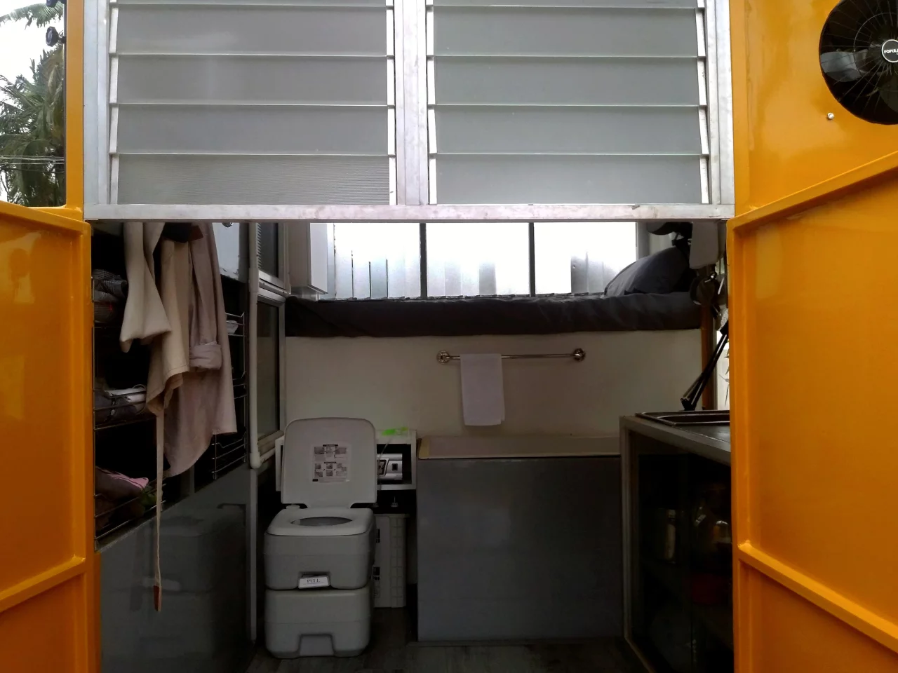 The Solo 01 includes a small camping toilet, kitchenette and even a bathtub