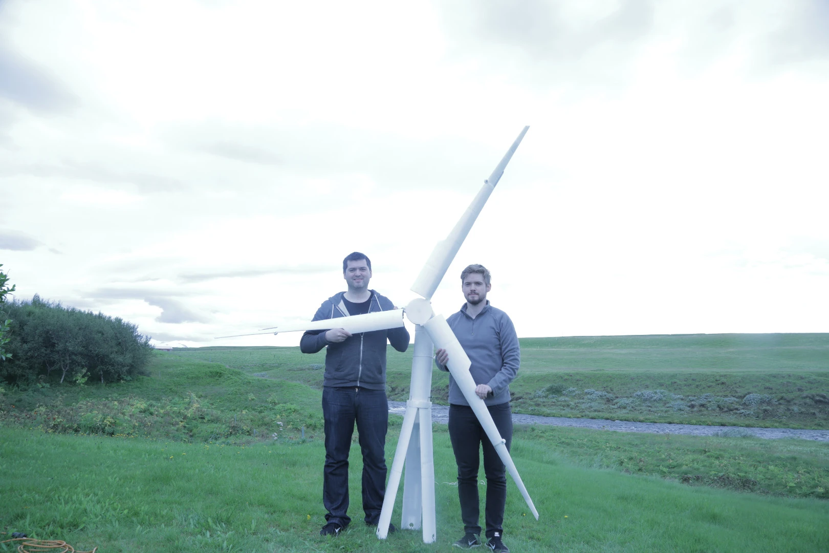 A 3D-printed prototype of the Trinity wind turbine, with company founders Einer and Agust Agustsson