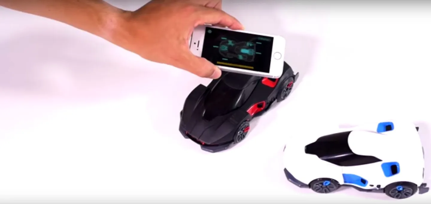 Linking each REV to the mobile device running the app is just a matter of holding the phone above the car to be controlled