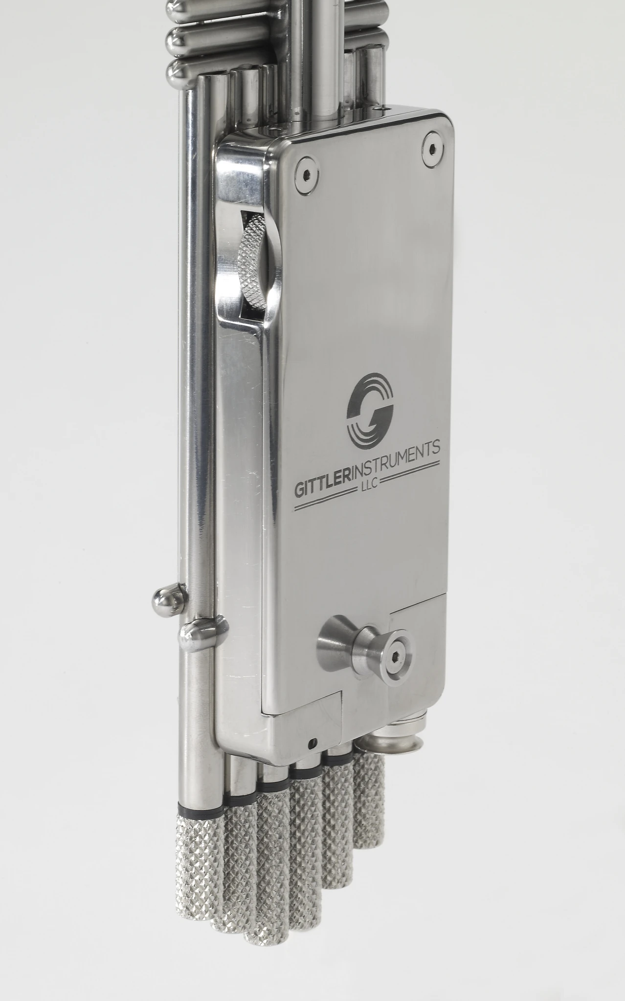The small E-Box at the back of the instrument has a volume wheel and a pair of assignable tactile buttons