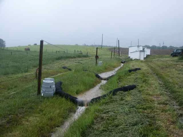 The compost filter socks in place, in a grassed waterway