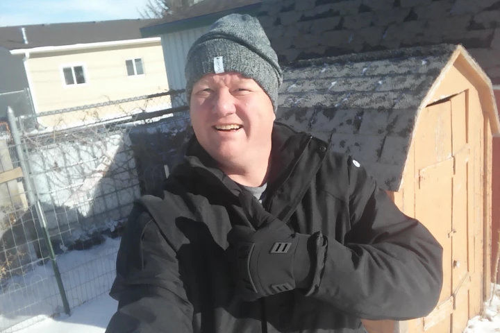 Oros' NASA-inspired winter gear copes well with chicken feeding duties in the depths of a Wyoming winter