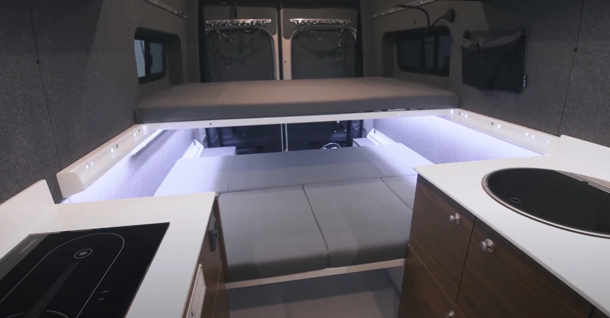 This three-person bunk bed layout + the two-person roof-top tent lets all five passengers sleep in the Kitsune