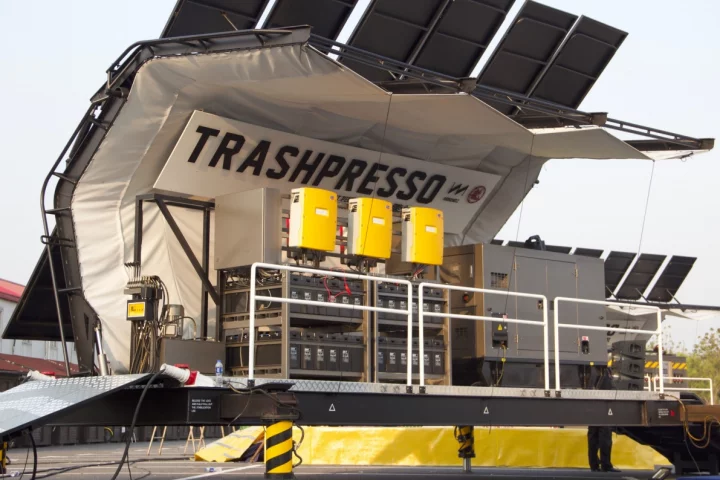 The Trashpresso is a semi-portable recycling center, that can turn discarded plastic and fabric waste into tiles