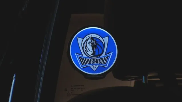 The Powerdecal displays backlit images through the window glass of a car