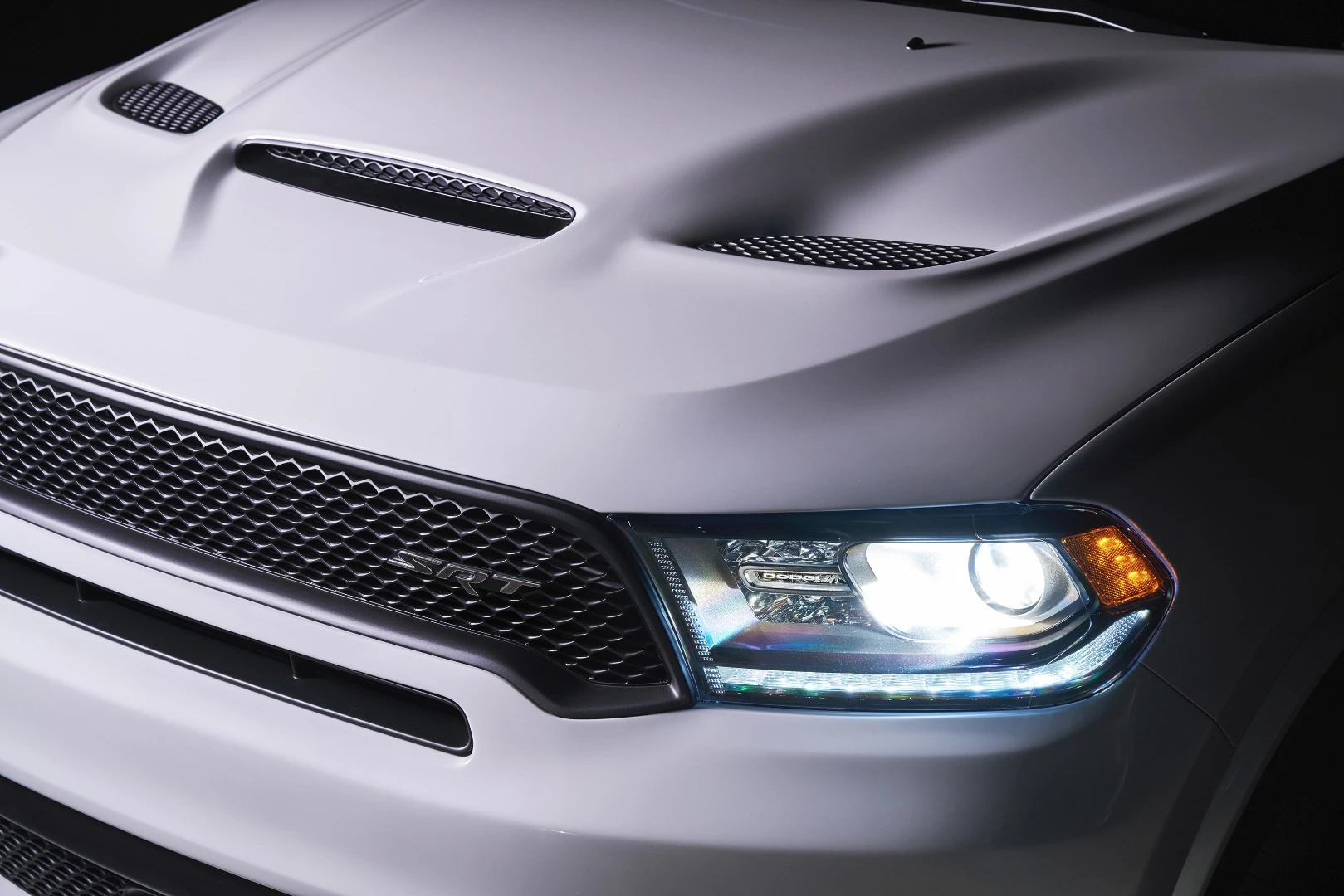 Aggressive intakes, akin to those found on the Challenger SRT models like the Hellcat and Demon, are part of the Durango SRT's build as well