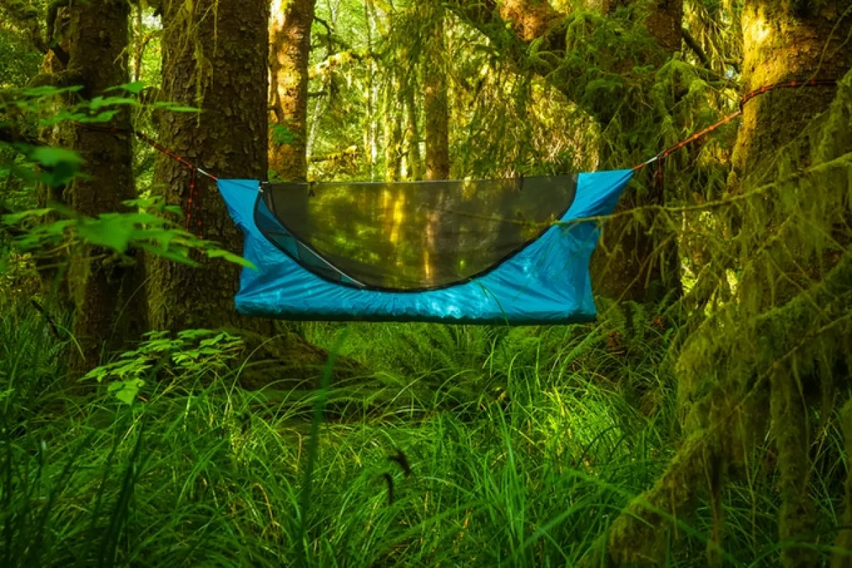 The Haven Tent can be suspended between two trees like a regular hammock, but offers occupants a flat sleeping platform thanks to an innovative design
