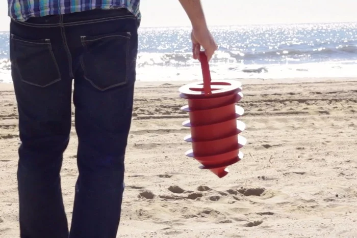 Beach Vault screws into the sand underneath your towel to keep your valuables out of sight
