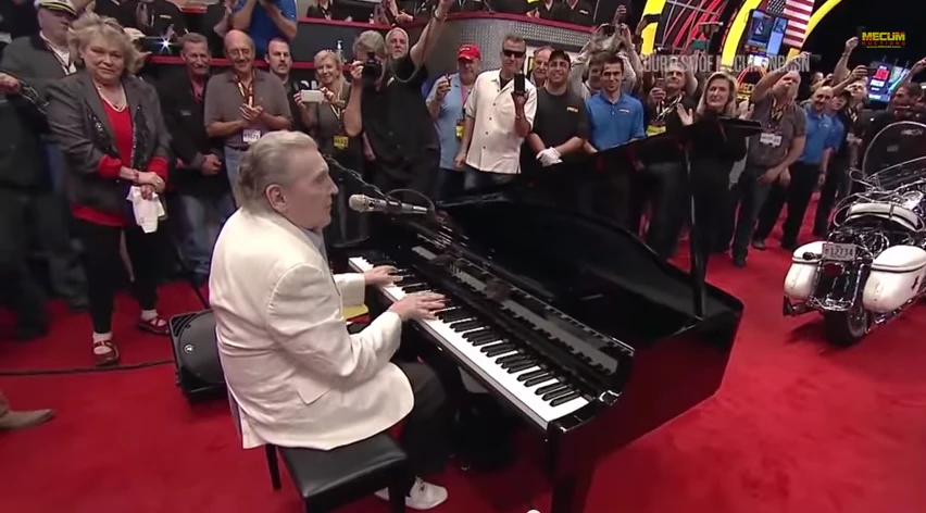 Jerry Lee Lewis singing "Great Balls of Fire" at the auction of his 1959 Harley-Davidson.