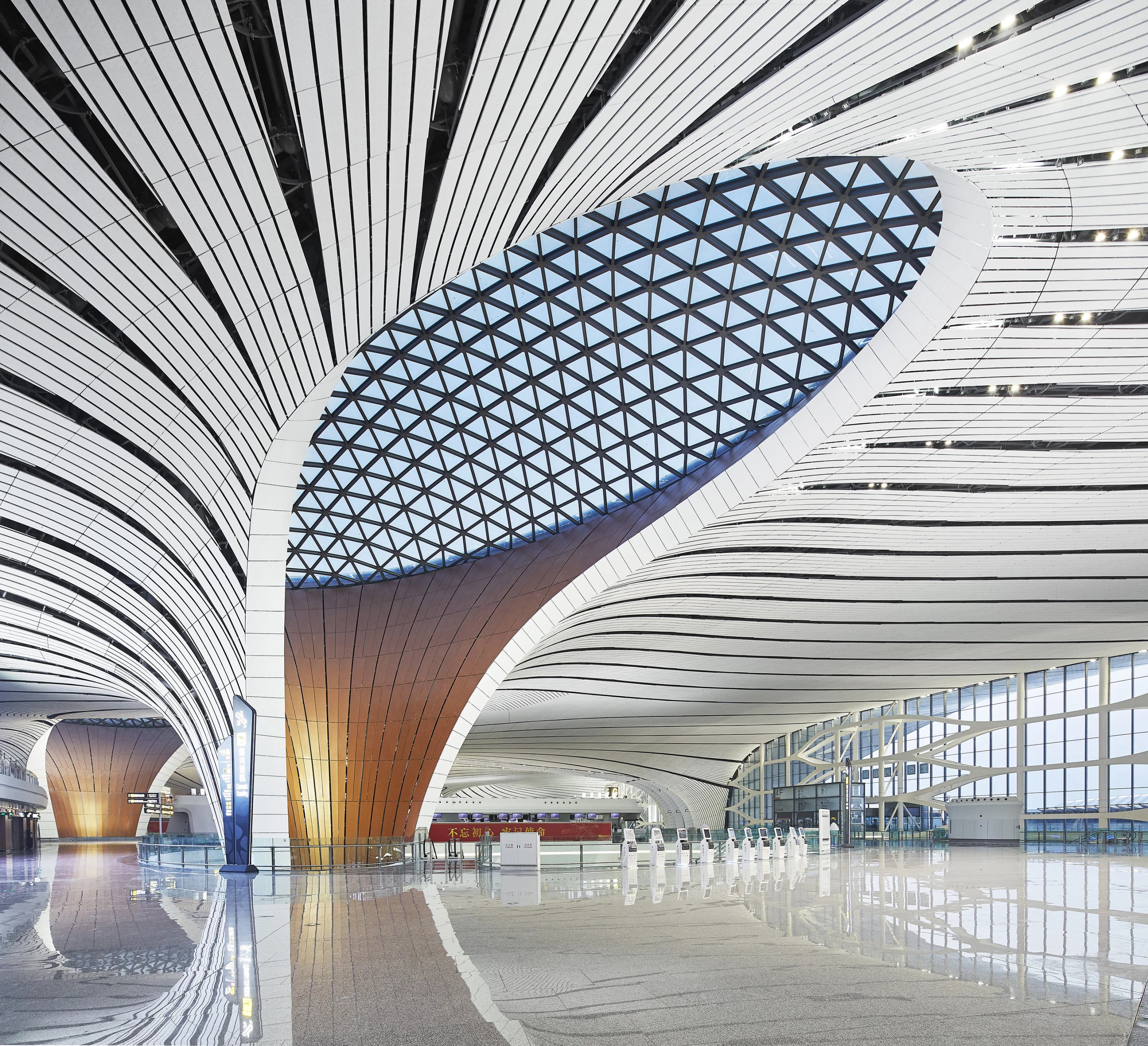 Beijing Daxing International Airport's interior is about 9 times the size of England's Buckingham Palace or roughly 3.5 times the size of China's Forbidden City
