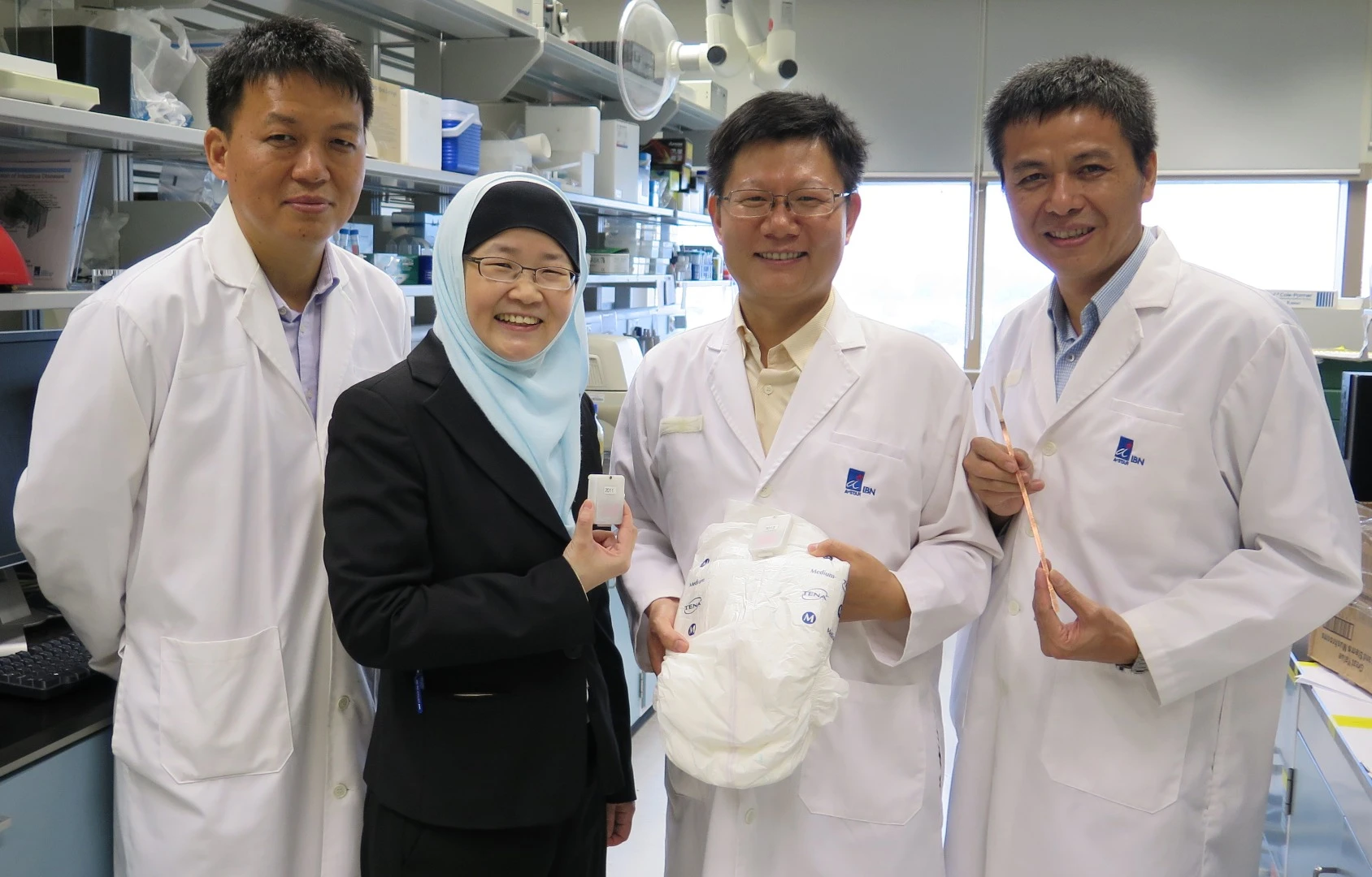 The IBN researchers who developed the diaper wetness monitoring system. From left: Dr Min Hu, Prof Jackie Y. Ying, Dr Rensheng Deng and Dr Guolin Xu