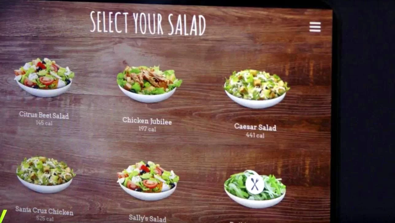 Sally uses a touch screen interface