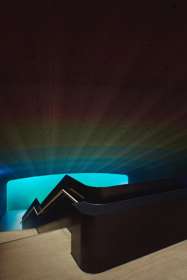 Under's visitors descend down an oak staircase
