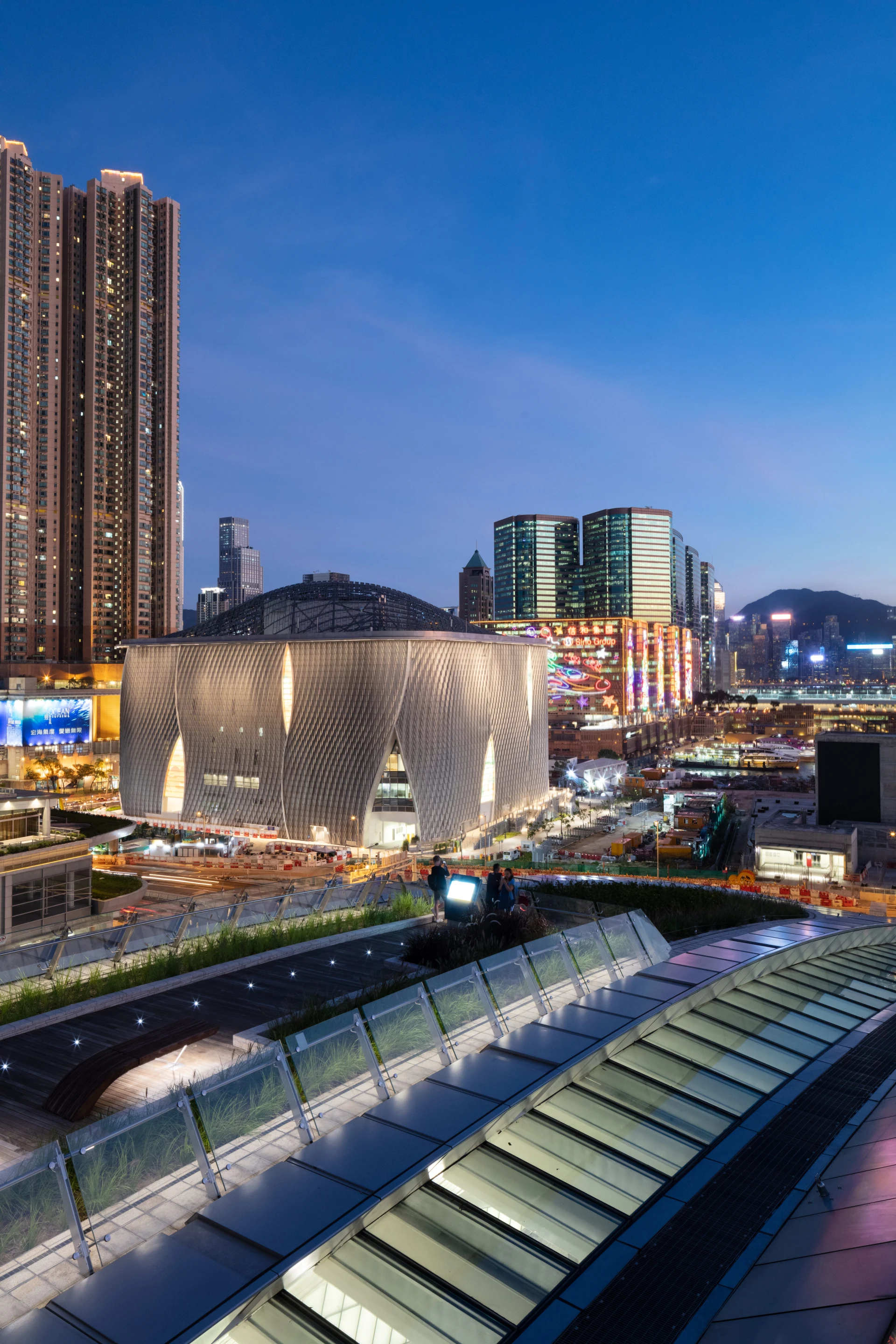 The Xiqu Centre's exterior comprises a modular system of scaled aluminum that was CNC-cut from untreated marine-grade piping