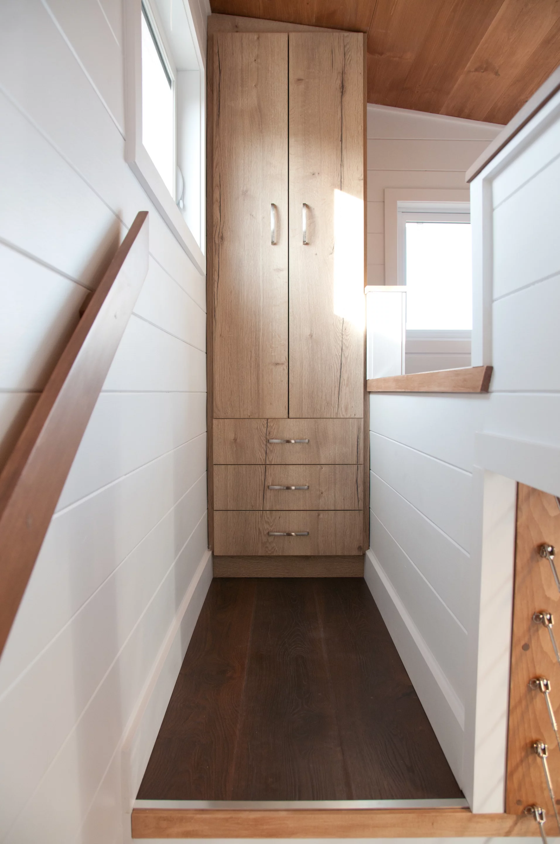 The Charme V2's main loft bedroom features a lowered platform area to make it easier to stand upright and get dressed