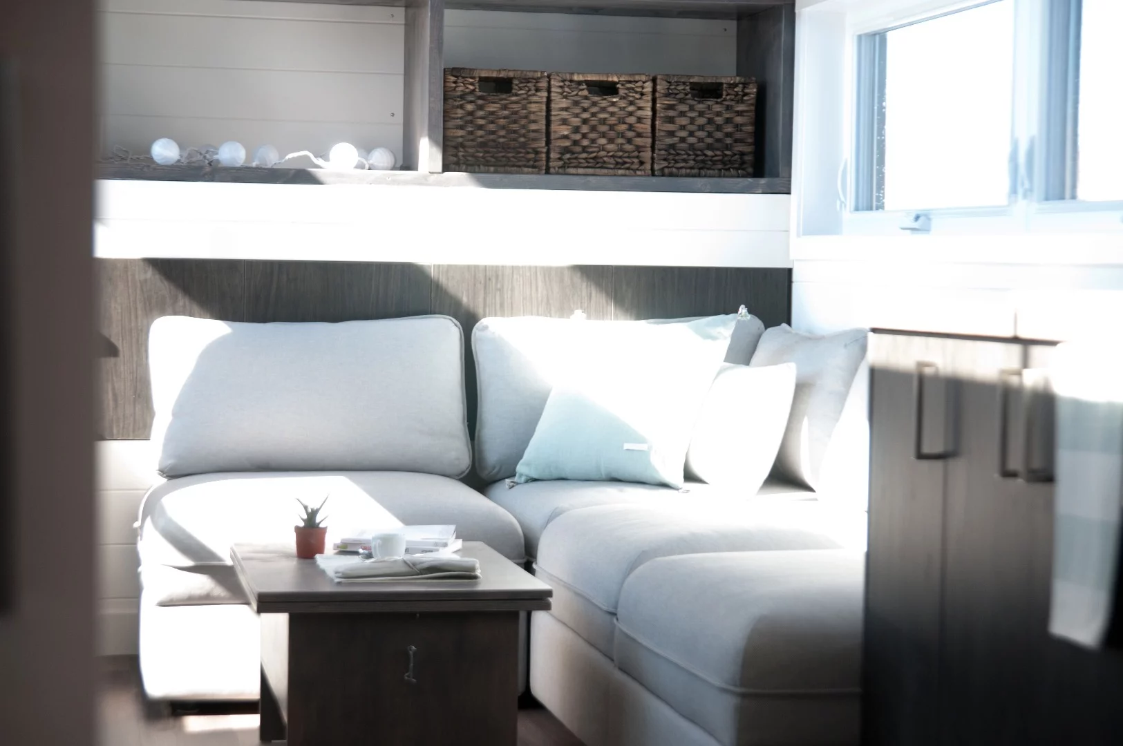 The Sakura's coffee table can be extended upward and unfolded to serve as a dining table