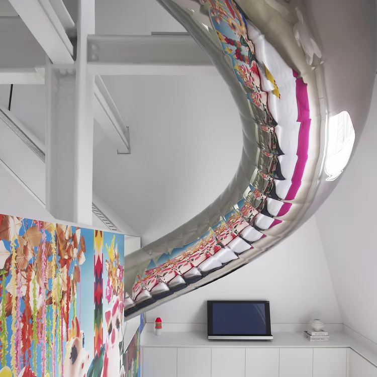 The slide passes through various areas of the penthouse (Photo: David Hoston)