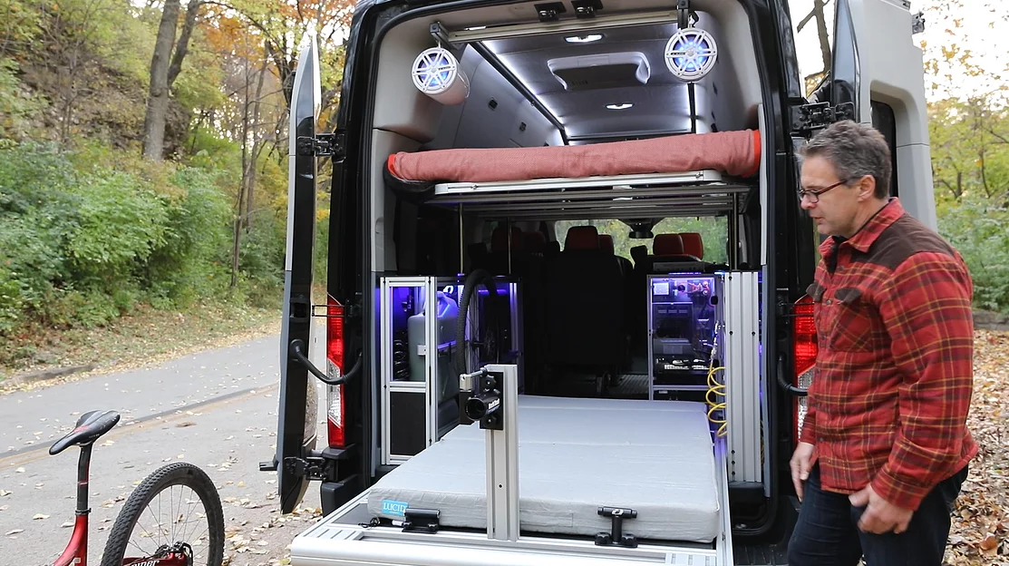 In addition to gear, the slide-out tray can hold a second mattress
