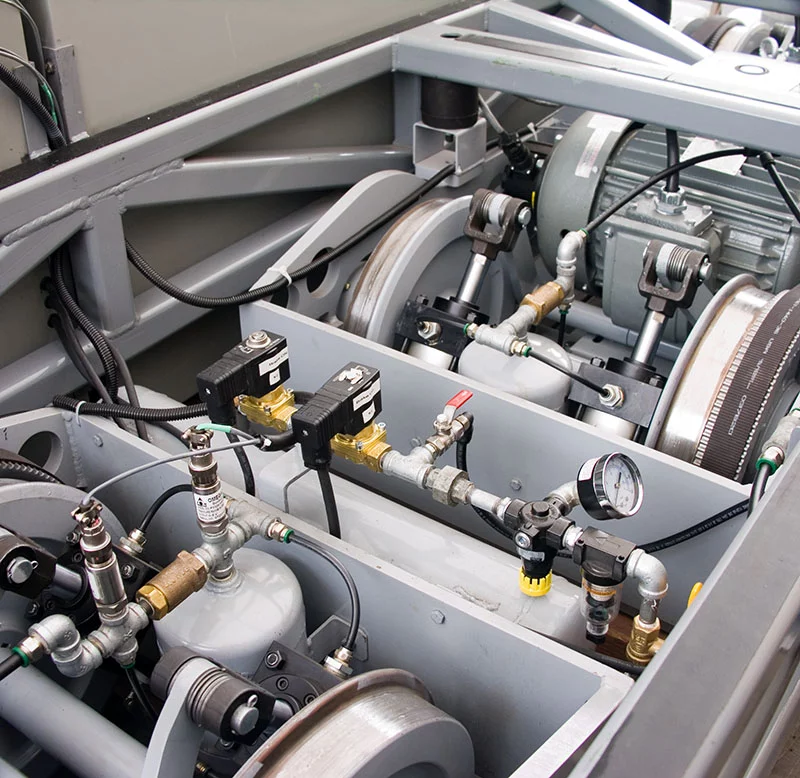 The ARES pilot vehicle axles are each driven by a high efficiency motor/generator via a low friction carbon fiber belt