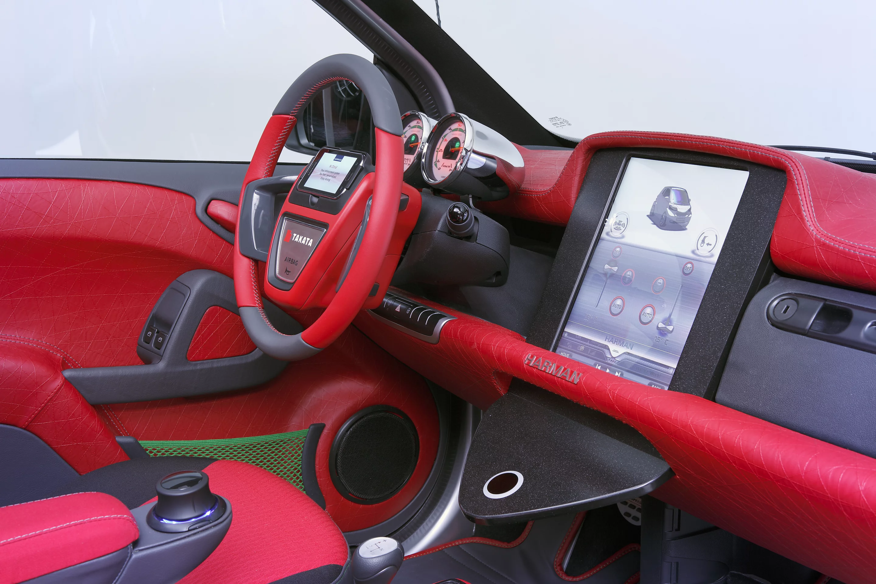 The dashboard is dominated by a 12.1-inch LCD screen