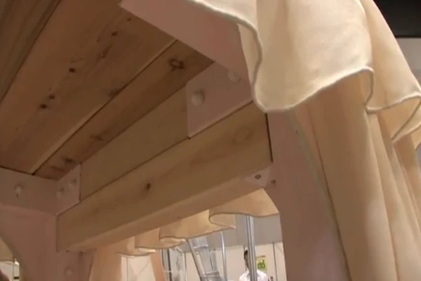 The bed is built using cypress wood from 30-40 year old tress and features an overhead canopy to provide adequate shelter from falling debris